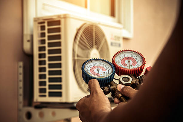 Professional Heat Pump Repair technician working in Jeffersonville, IN